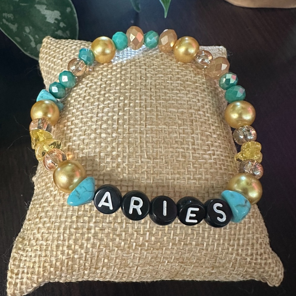 Homemade (by me) Glass and Ceramic beaded stretch bracelet. Fits M/L adult wrist
